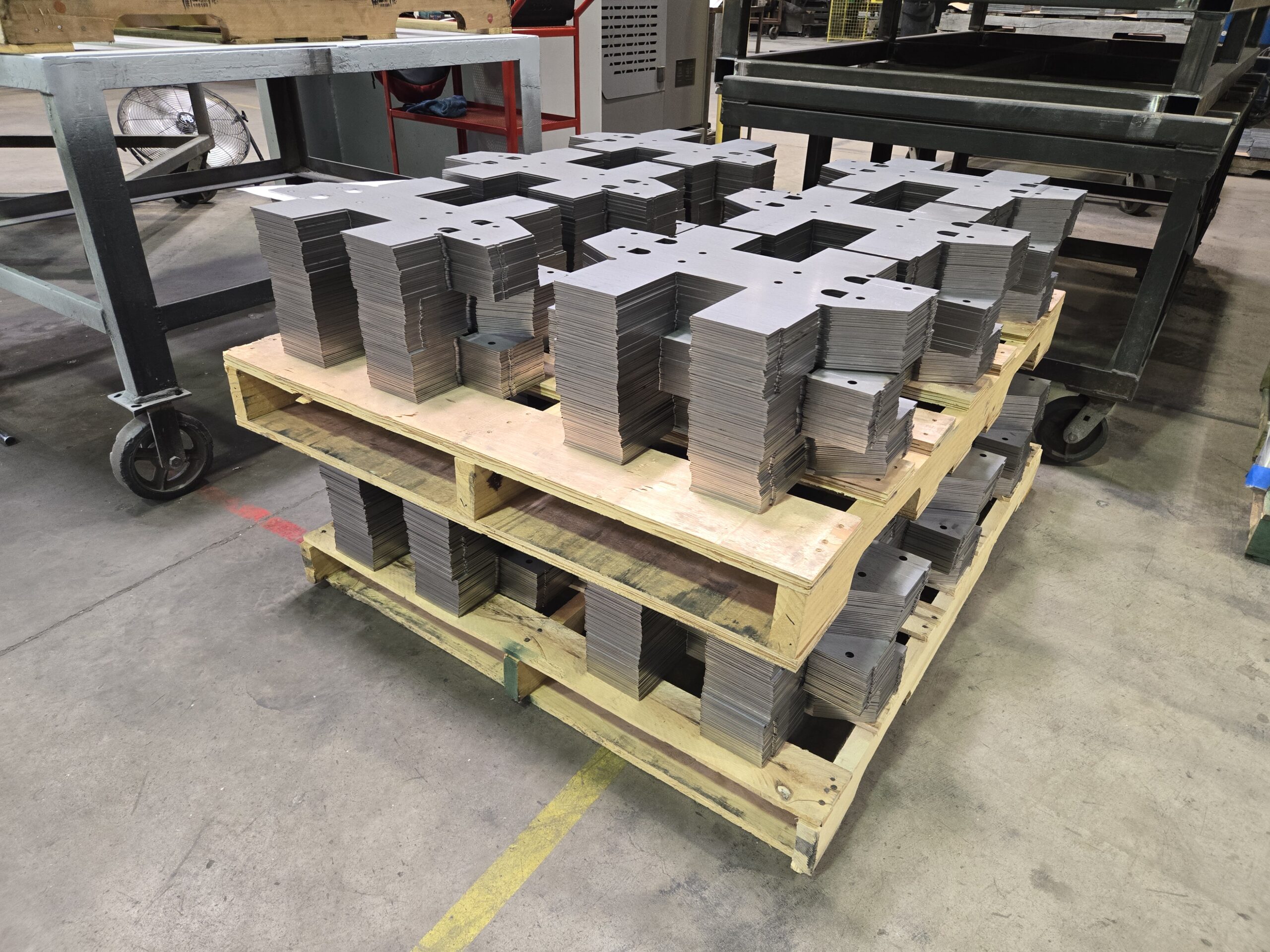 Hot Roll Pickle in Oil plate cut into parts by a fiber laser